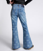 Load image into Gallery viewer, Low waist denim flare jeans on model
