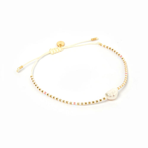 white, gold, pink & pearl beaded bracelet.