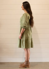 Load image into Gallery viewer, Model wearing khaki tiered dress side shot
