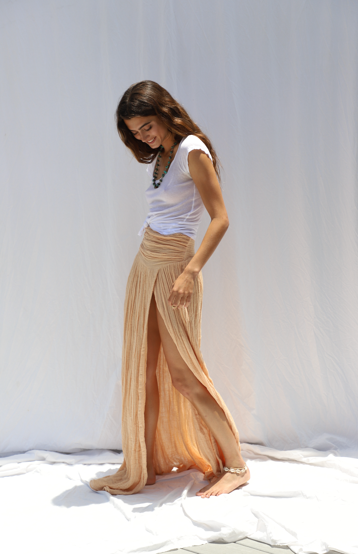 Golden maxi skirt on model