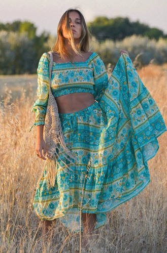 Turquoise flutter skirt on model