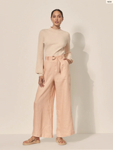 Load image into Gallery viewer, Model wearing Sand coloured Ainsley pants with knitted top.
