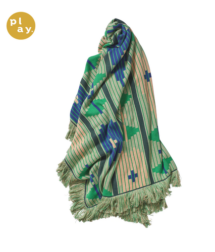 Throw with geometric green & blue patterns