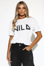 Load image into Gallery viewer, White tee with &#39;WILD&#39; black writing on model
