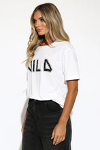 Load image into Gallery viewer, White tee with &#39;WILD&#39; black writing on model

